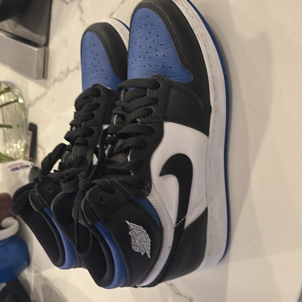Preowned air Jordan shoes size 7y.  Minor wear, minor creasing.